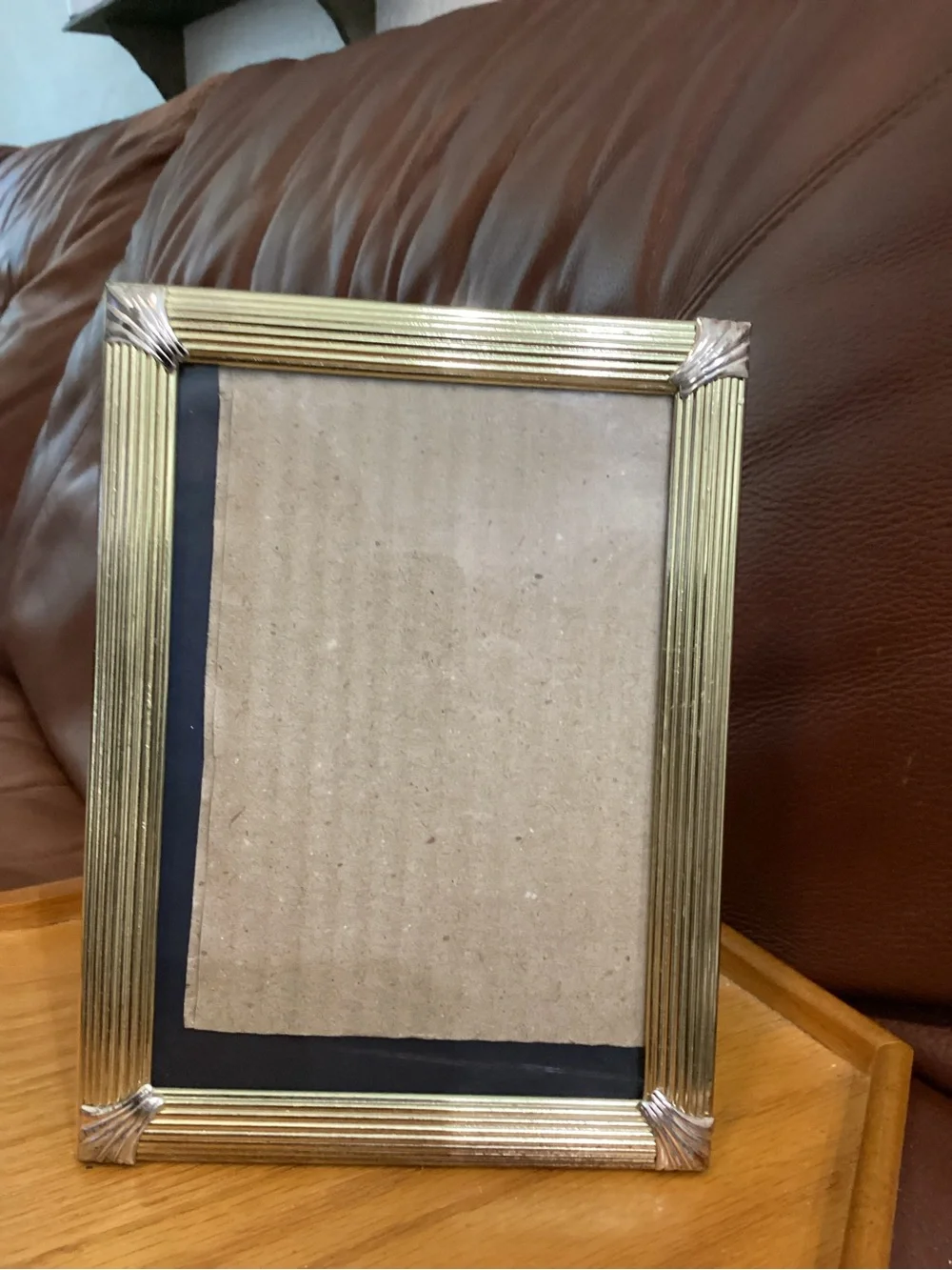 Gold Ribbed Photo Frame with silver accents holds a 5x7